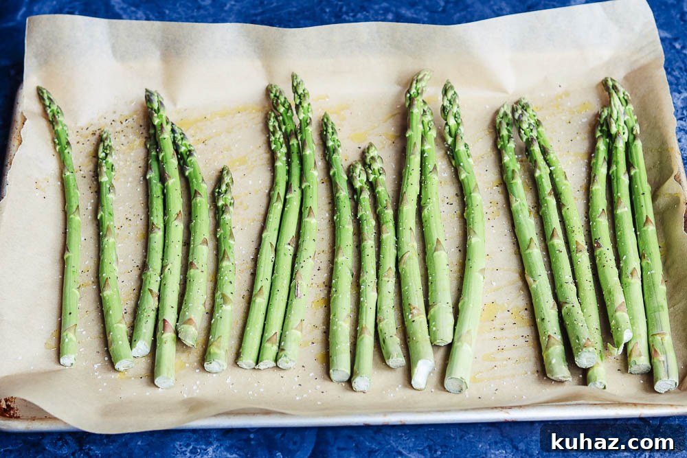 Roasted Asparagus and Tomato Pesto Melt Recipe 5 asparagus on tray
