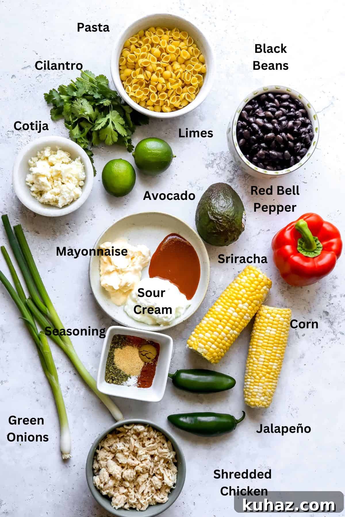 Ingredients to make this recipe in ceramic small bowls on a white counter. 