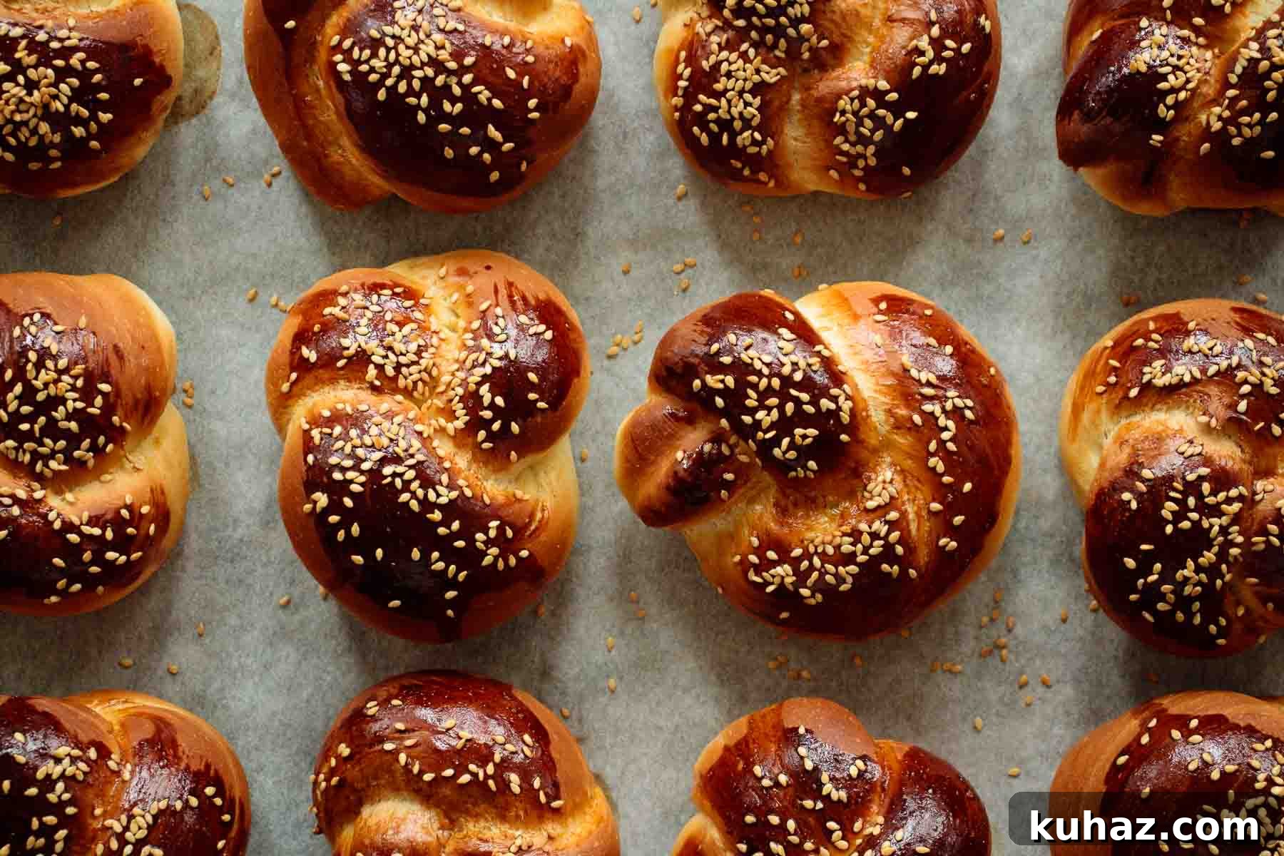 Soft Challah Rolls Recipe for Fluffy Challah Buns 14 A tray full of baked challah rolls.