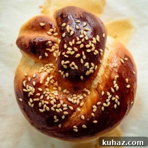 Soft Challah Rolls Recipe for Fluffy Challah Buns 20 close up of a challah roll, just baked