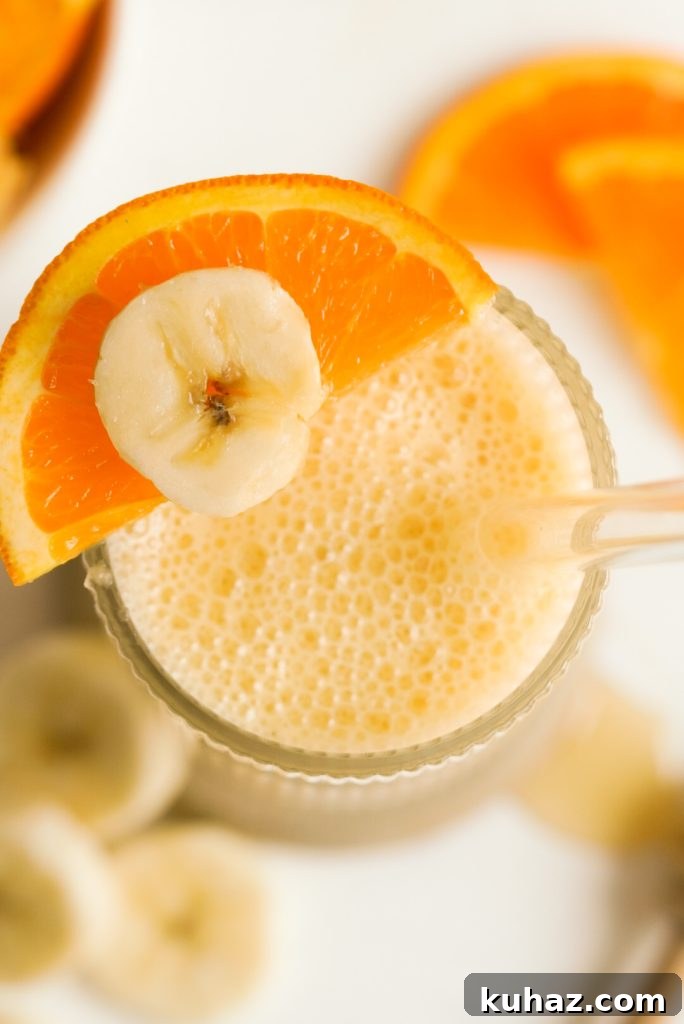Orange Banana Smoothie Recipe 3 overhead shot of an orange banana smoothie