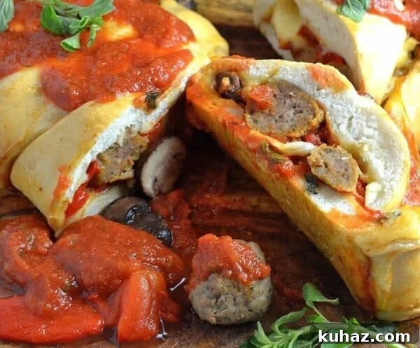 Baked Meatballs in Marinara with Melted Mozzarella 9 A close up of Meatball and Stromboli
