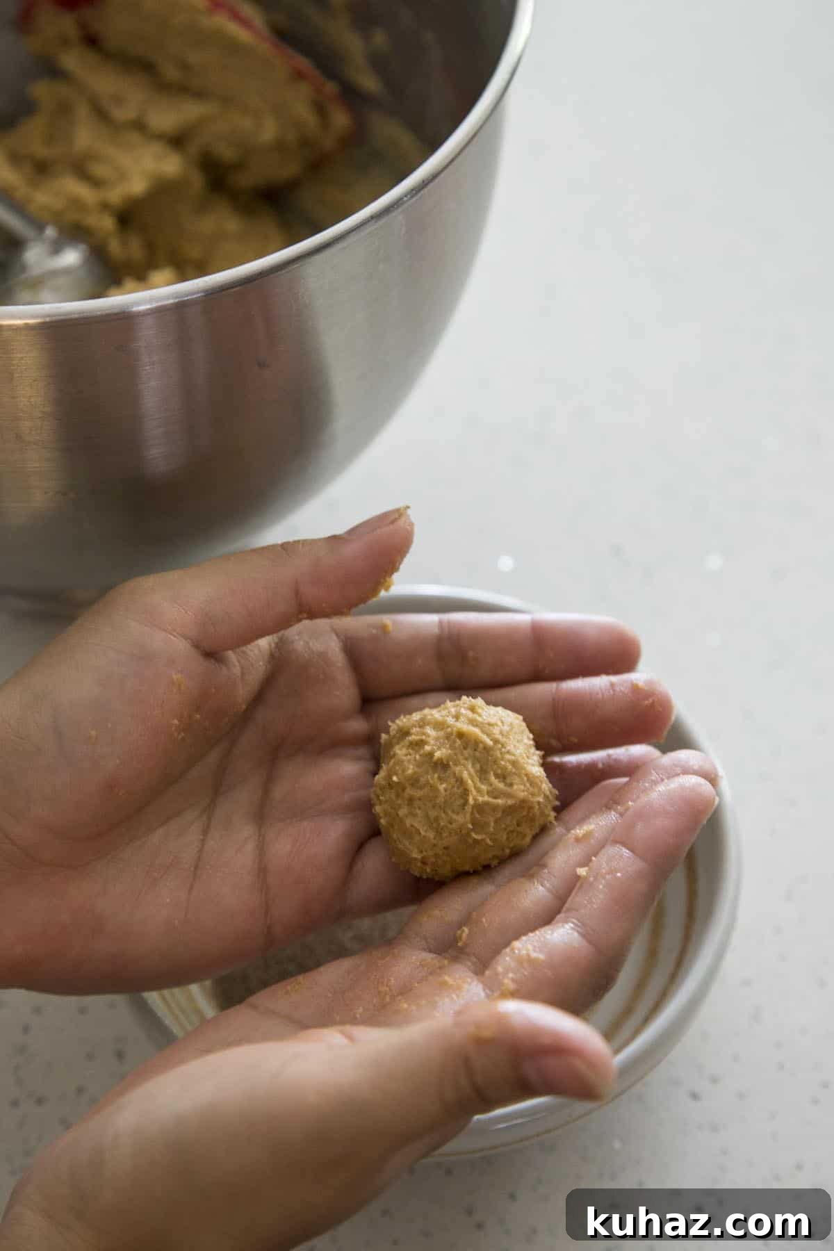 Pumpkin Snickerdoodle Cookies Recipe 4 Rolling cookie dough into balls.