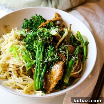 spicy pork with vegetables over ramen
