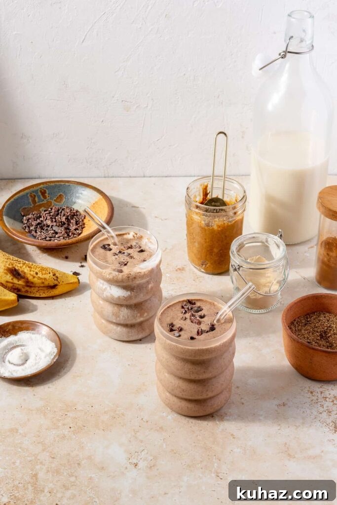 Snickerdoodle Cookie Smoothie Recipe 5 Pouring snickerdoodle smoothie into a glass