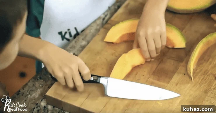 Kitchen Tools for Kids: Kids Cook Real Food Episode 197 2 cutting cantaloupe with a kid-sized knife