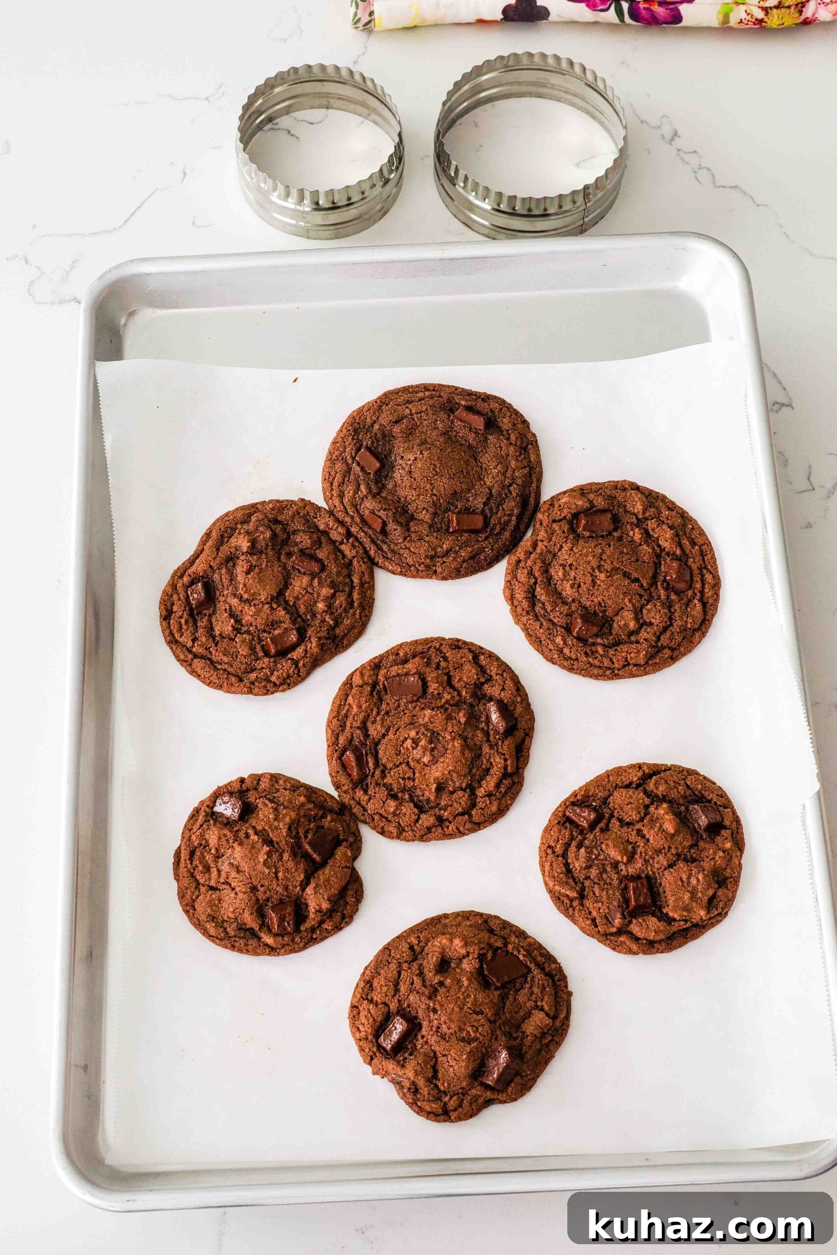 Chewy Double Chocolate Chip Cookies Recipe 14 Double chocolate chip cookies before being swirled with a circle cutter.