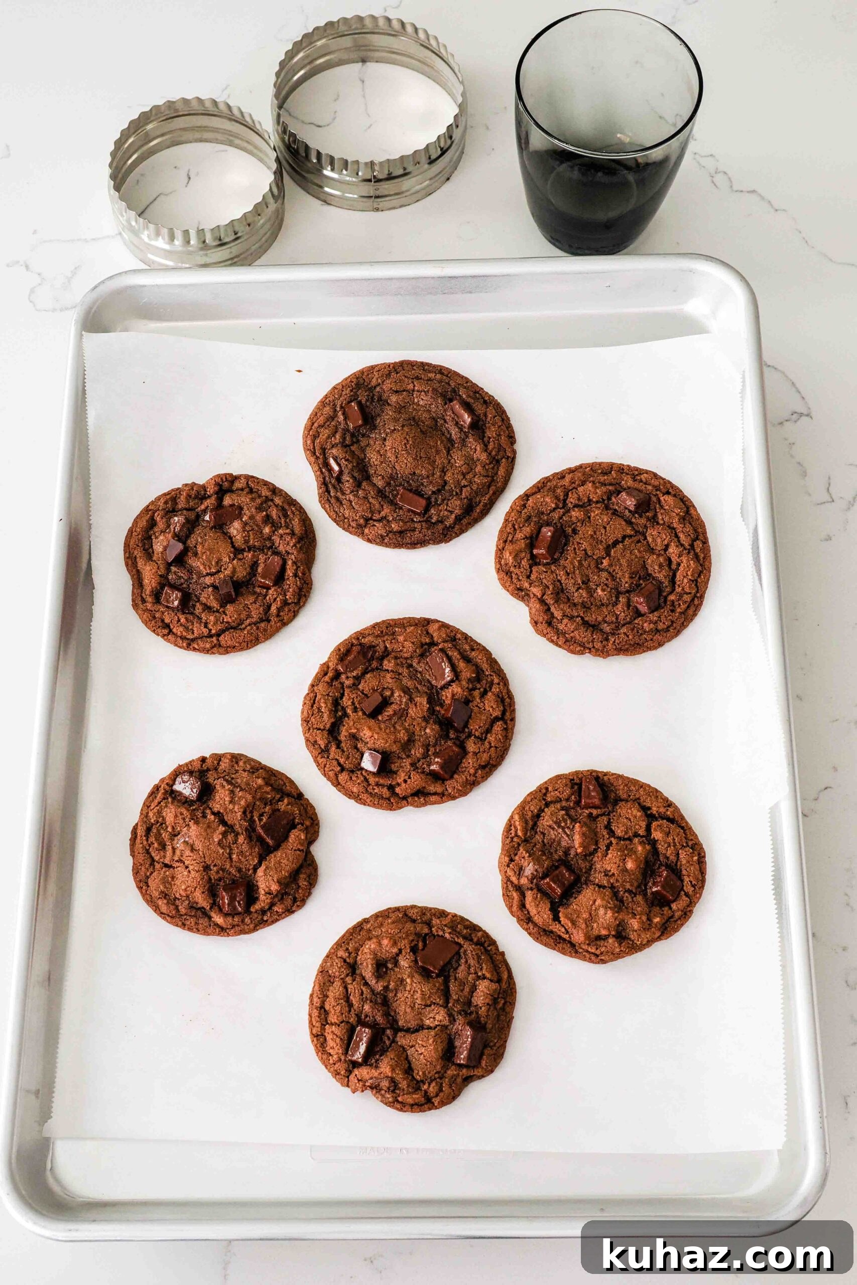 Chewy Double Chocolate Chip Cookies Recipe 15 Double chocolate chip cookies after being swirled with a circle cutter.