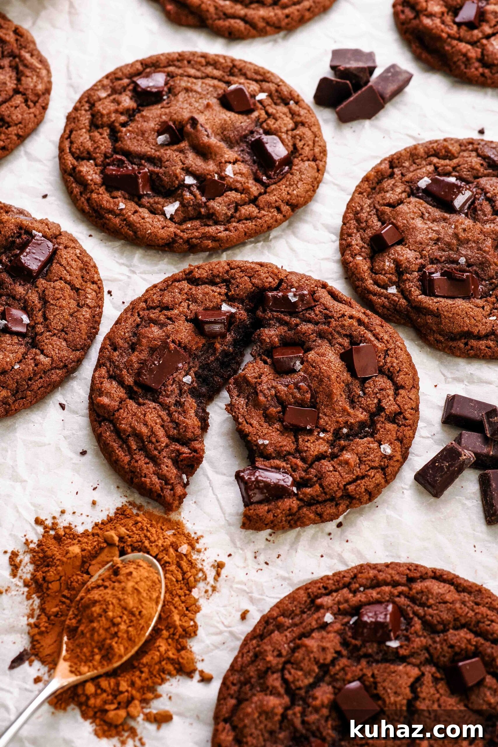 Chewy Double Chocolate Chip Cookies Recipe 16 A double chocolate chip cookie broken in half.