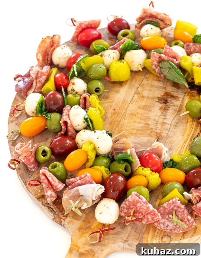 Skewers with antipasto ingredients on them, arranged in the shape of a circle.