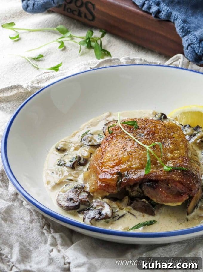 Chicken Thighs in Tarragon Mushroom Cream Sauce 2 Chicken Thighs with Mushrooms and Tarragon Cream features golden chicken thighs in a white wine and cream sauce flavored with browned mushrooms and fresh tarragon. 7 net carbs per serving.
