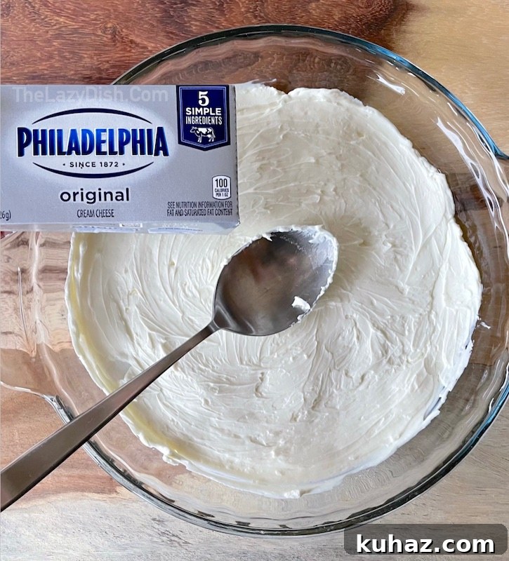 3-Ingredient Chili Cheese Dip Recipe 4 Are you looking for easy cream cheese dips to make for a party? This Chili Cheese Dip is perfect for feeding a crowd! Serve it with tortilla chips for the best finger food, ever.