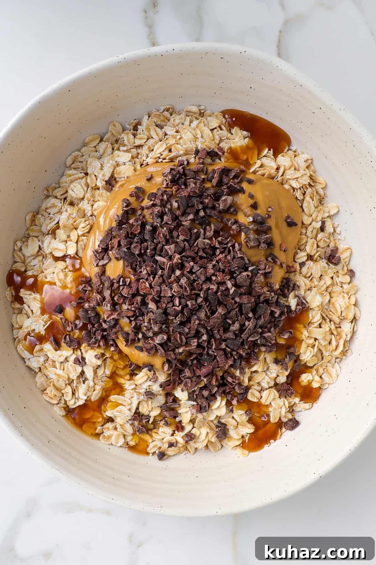 No-Bake Peanut Butter Bliss Balls: Protein-Packed Bites 5 Ingredients in a bowl.
