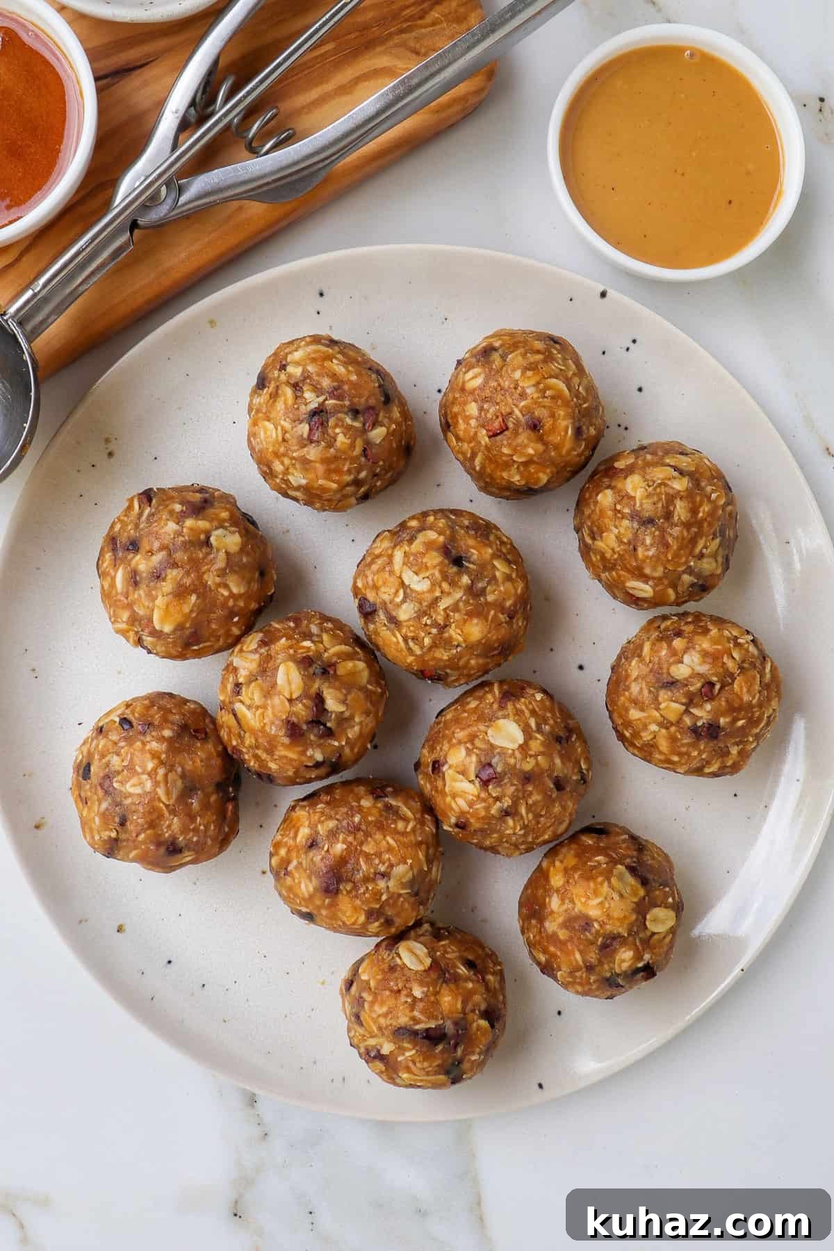 No-Bake Peanut Butter Bliss Balls: Protein-Packed Bites 7 Bliss balls on a plate.
