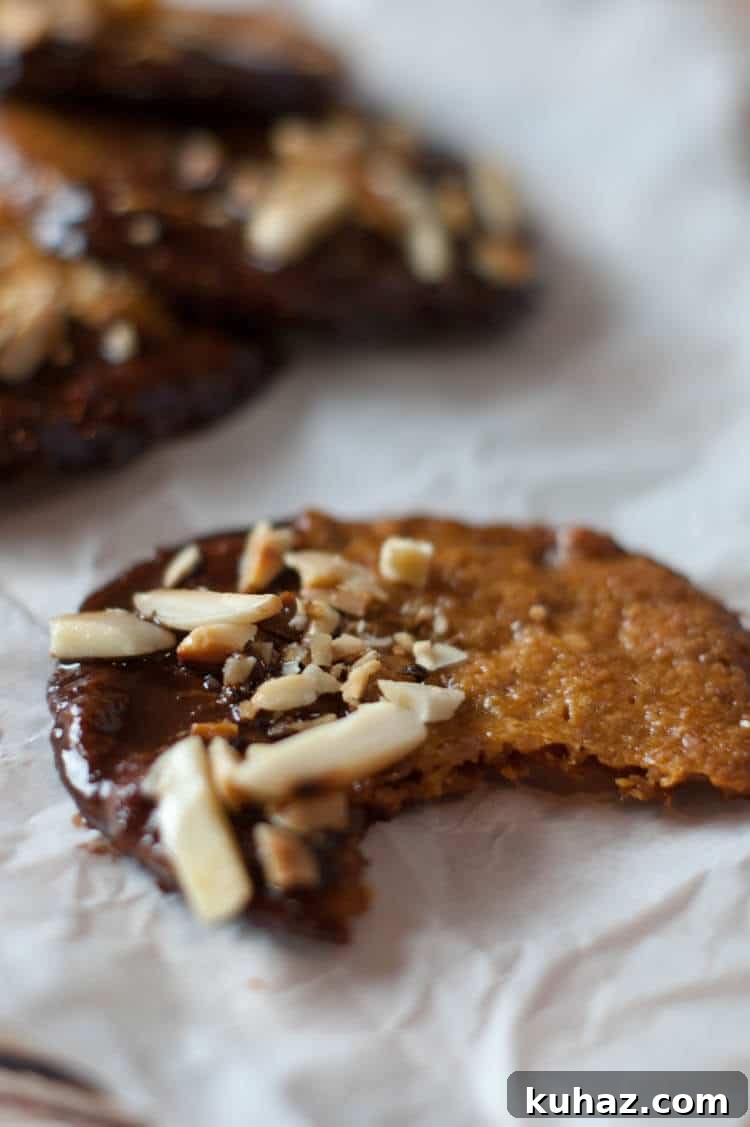 Almond Orange Cookies: Gluten-Free Paleo GAPS Recipe 3 Almond Orange Cookies -With hints of orange zest, these crispy thin almond cookies are dunked in chocolate and topped with toasted almonds. These Almond Orange Cookies are naturally gluten free, primal and GAPS with Paleo version.