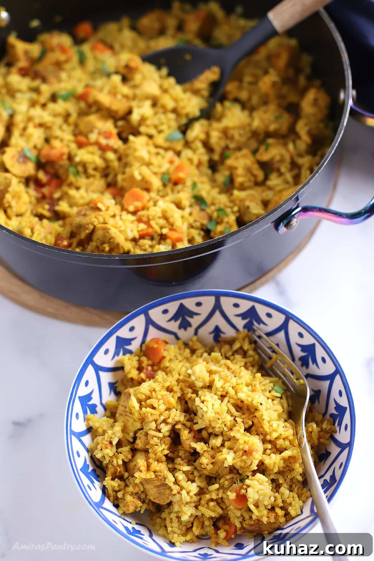 Moroccan Chicken with Saffron Rice 11 Moroccan rice in a bowl with a spoon in it.