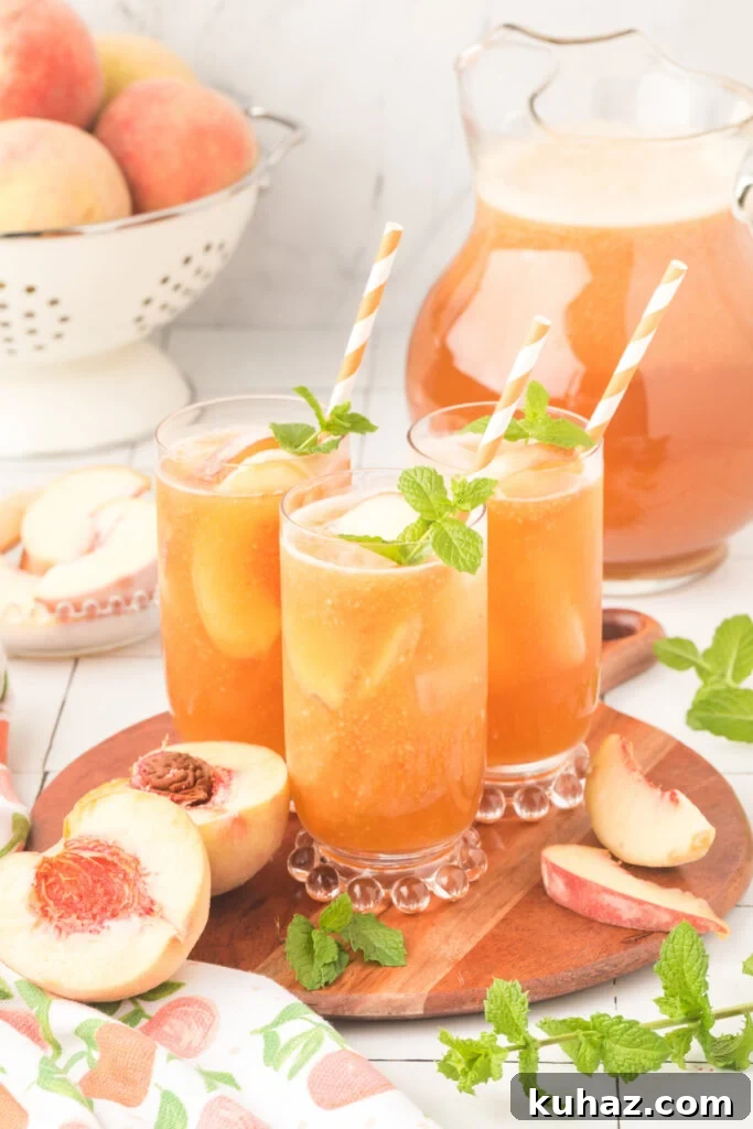Southern Peach Iced Tea Recipe with Fresh Peaches 5 glasses of southern iced peach tea on serving tray