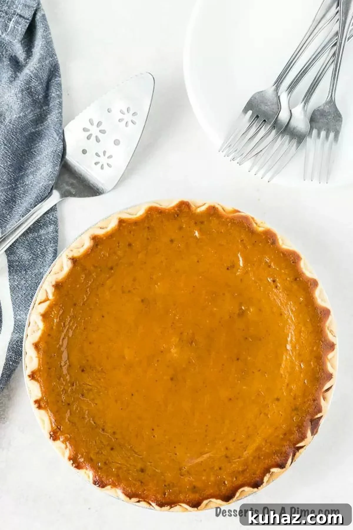 Classic Creamy Pumpkin Pie with Flaky Crust 8 Whole Pumpkin Pie ready to slice.