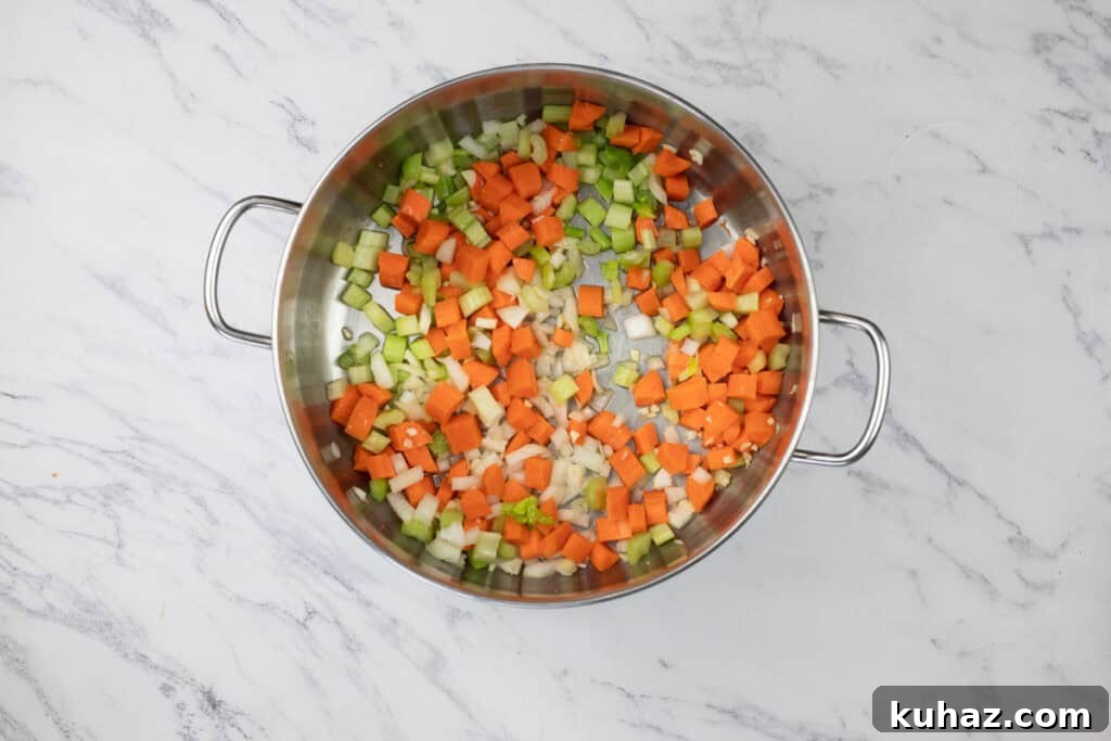 Creamy Turkey Noodle Soup Recipe with Leftover Turkey 6 Cook diced onions, carrots, and celery until softened, about 5 minutes.