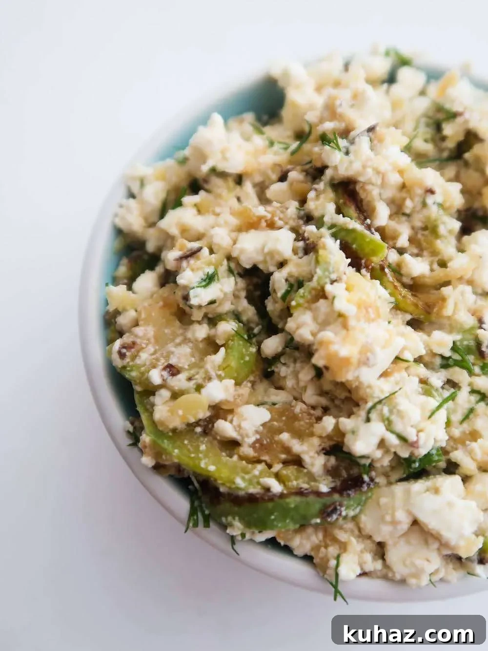Feta zucchini dip served with salad and bread