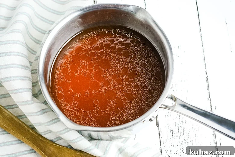 Slow Cooker Pork Tenderloin with Savory Gravy 6 Gravy From Slow Cooker in saucepan ready to thicken