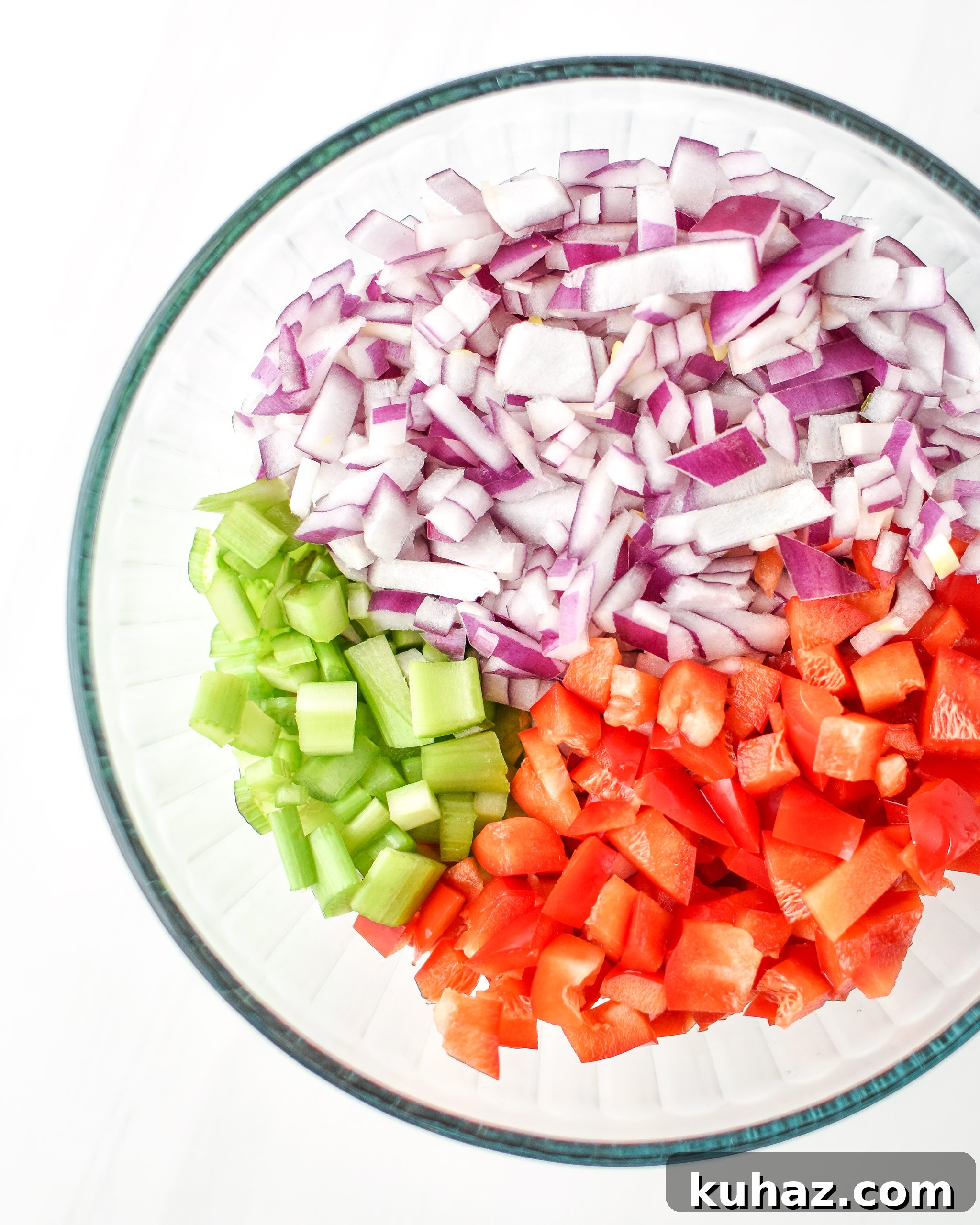 Whole30 Chicken Bacon Ranch Casserole Recipe 3 Diced red onion, celery and red pepper for the Whole30 Chicken Bacon Ranch Casserole.