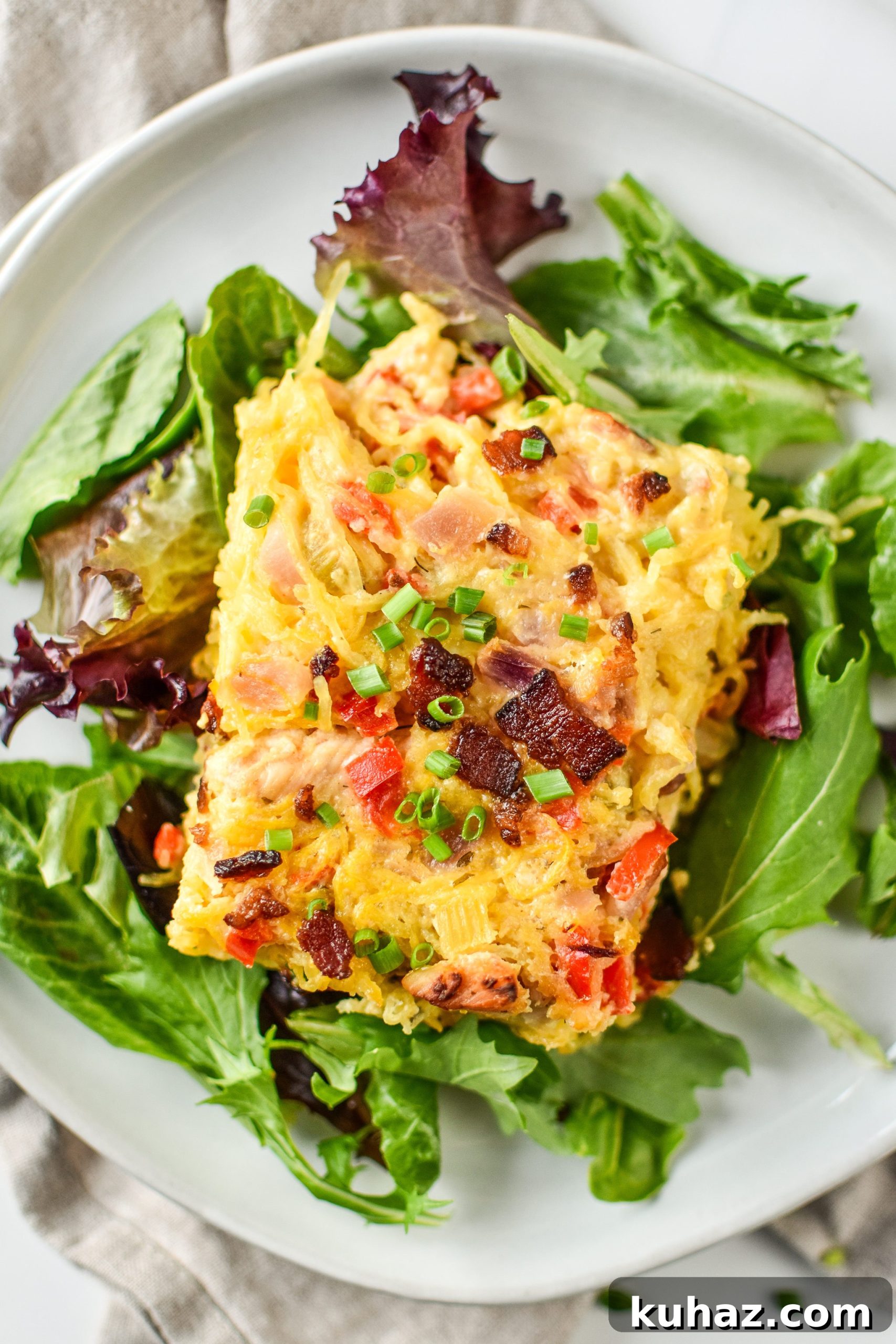 Whole30 Chicken Bacon Ranch Casserole Recipe 8 One serving of the Whole30 Chicken Bacon Ranch Casserole served over greens.