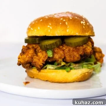 A side view of a Nashville hot chicken sandwich.