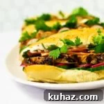 A side view of a plate of grilled chicken banh mi sandwiches.
