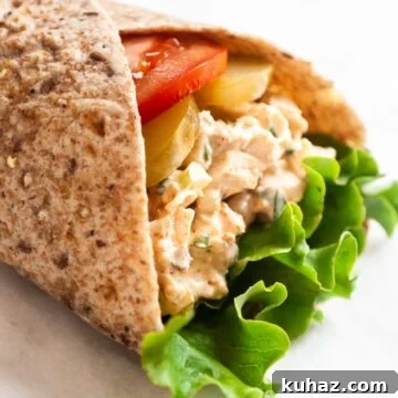A close up view of a piri piri chicken wrap.