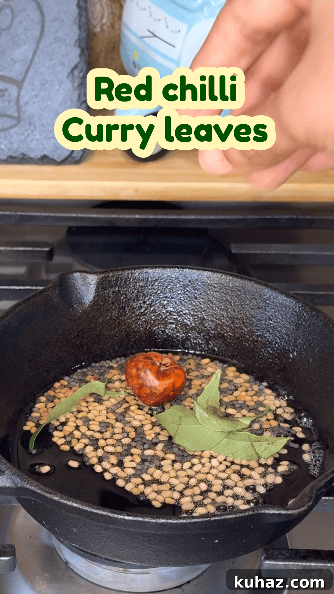 Add red chilli and curry leaves