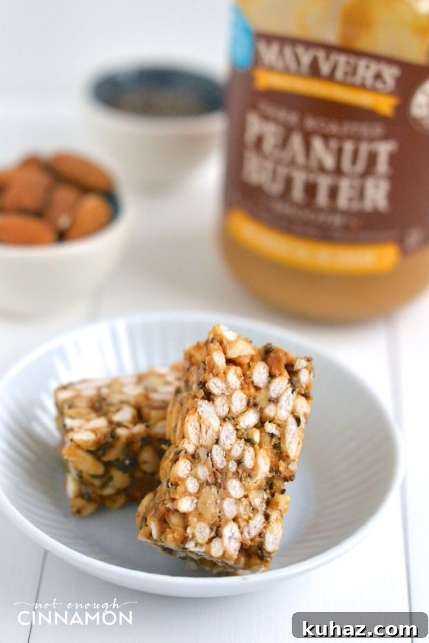 Clean Eating Peanut Butter Rice Krispie Treats 5 Healthy Peanut Butter Rice Crispy Treats on a small white plate