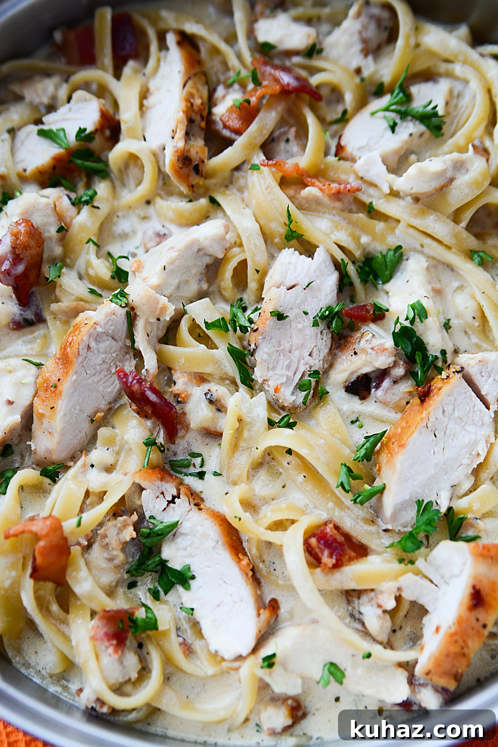 Creamy chicken and bacon pasta served with a rich Parmesan sauce