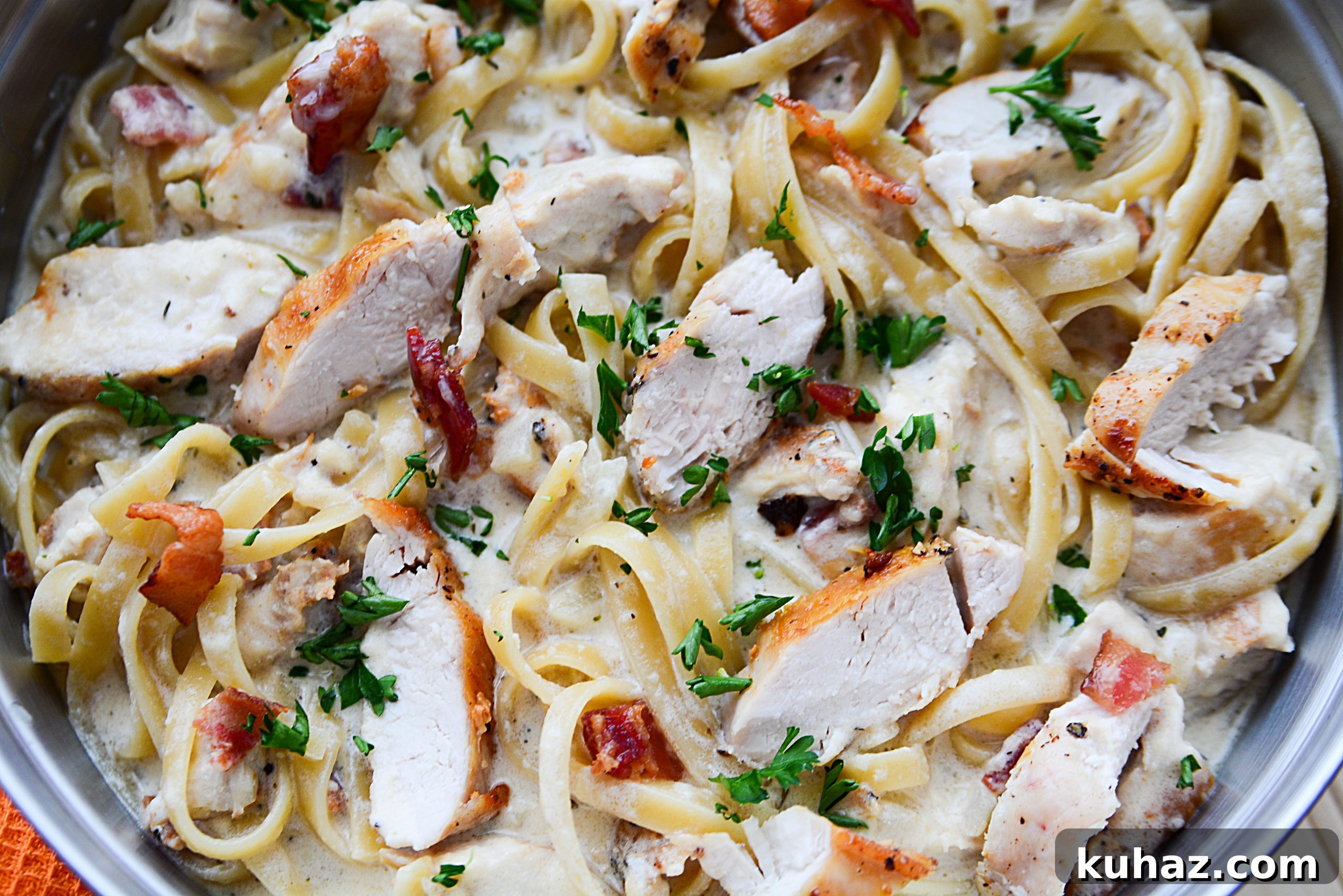 Creamy chicken bacon pasta topped with parsley