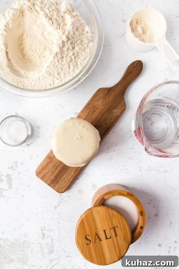 Ingredients for sourdough, starter, flour, salt and water