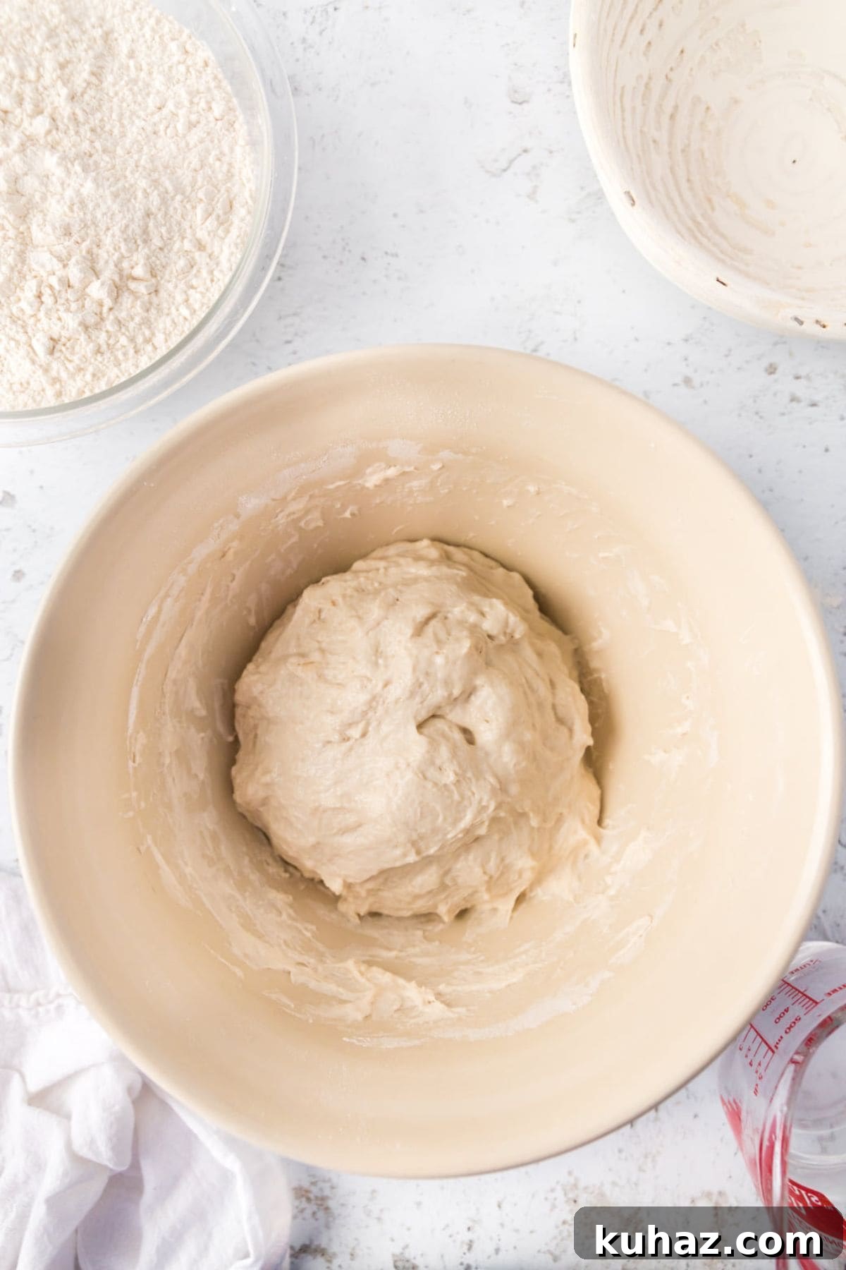 Sourdough ingredients mixed up in a large mixing bowl.