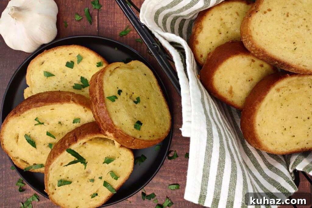 Air Fryer Frozen Texas Toast: Crispy in Minutes 6 overhead view of texas toast on a plate next to a basket with more slices