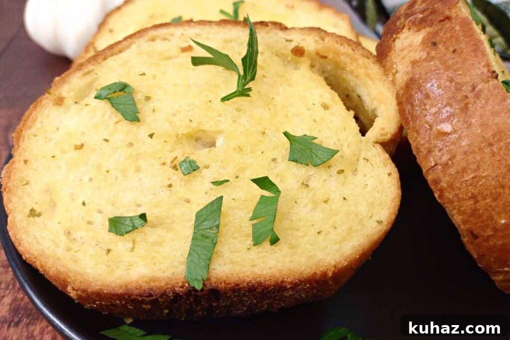 Air Fryer Frozen Texas Toast: Crispy in Minutes 7 close up of air fryer texas toast on a plate with parsley