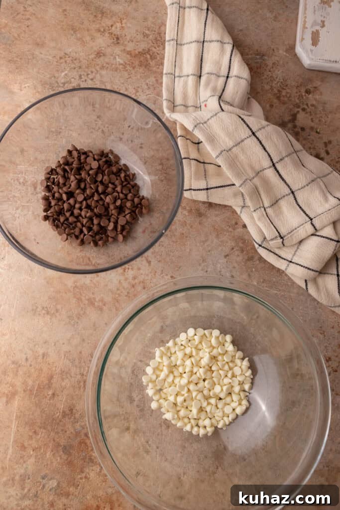 No-Bake Cookies and Cream Muddy Buddies Recipe 5 milk chocolate and white chocolate chips in separate bowls