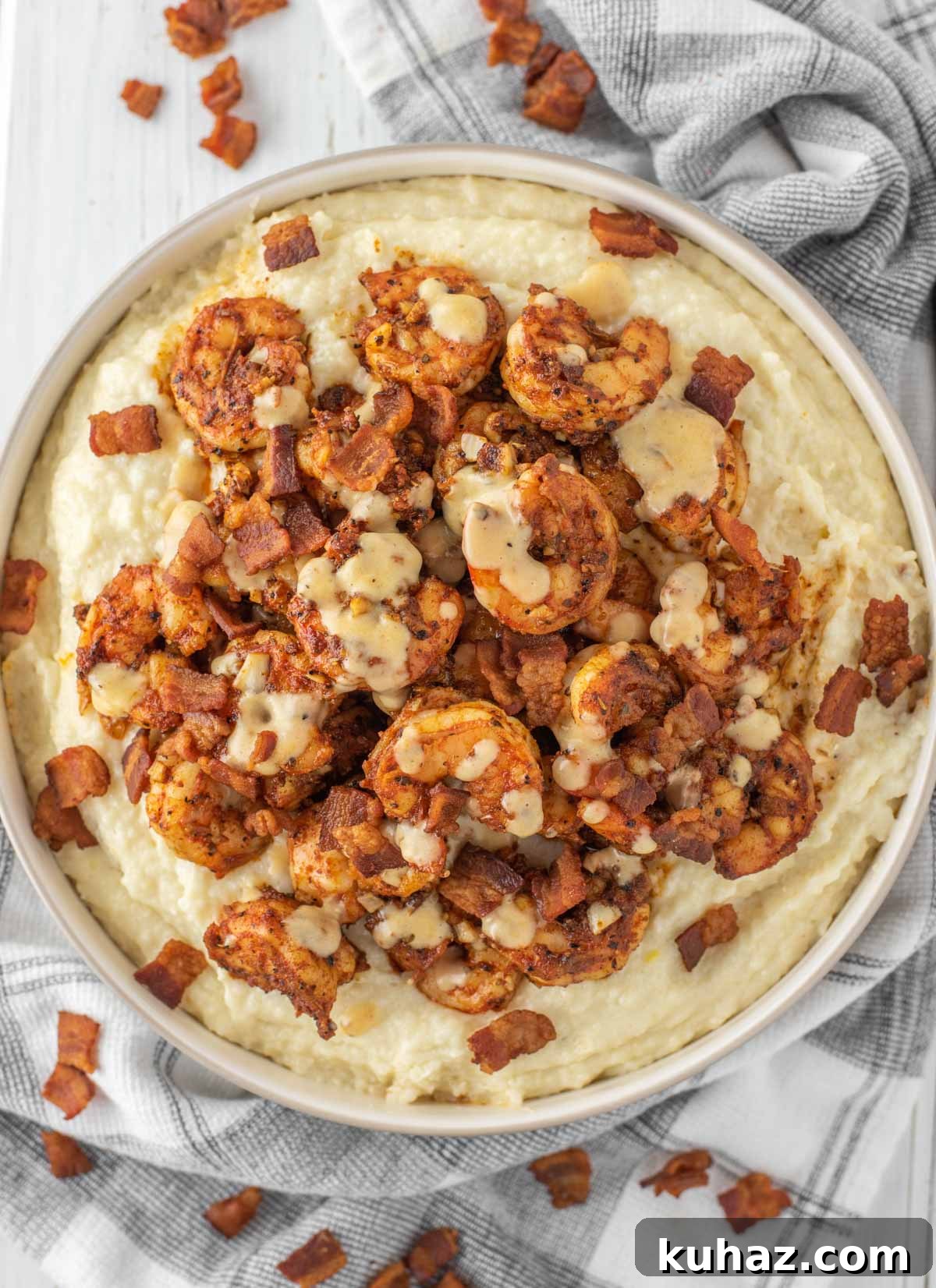 Spicy Cajun Shrimp with Creamy Grits 2 overhead shot of Cajun shrimp and grits in bowl