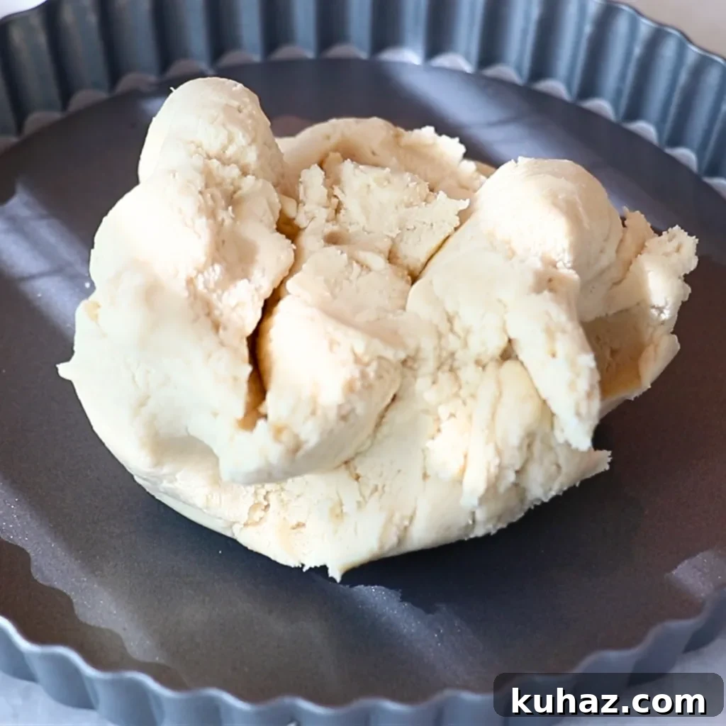 Buttery Classic Shortbread Cookies Recipe 22 shortbread cookie dough in a tart pan