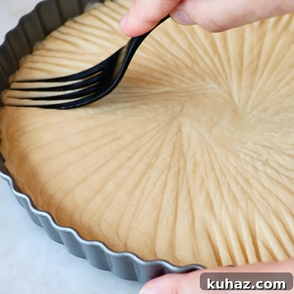 Buttery Classic Shortbread Cookies Recipe 23 adding patterns with a fork to the edge of pressed shortbread cookies