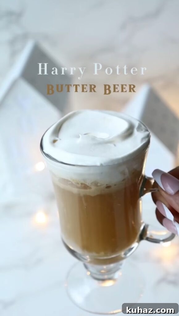How to Make Harry Potter Butterbeer at Home 2 Tall glass of homemade butterbeer with frothy topping