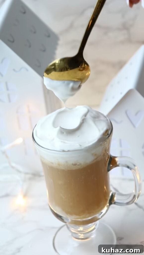 How to Make Harry Potter Butterbeer at Home 4 Glass of butterbeer with whipped cream on top